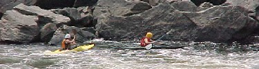 Photo of kayakers enjoying rapids along the Potomac River